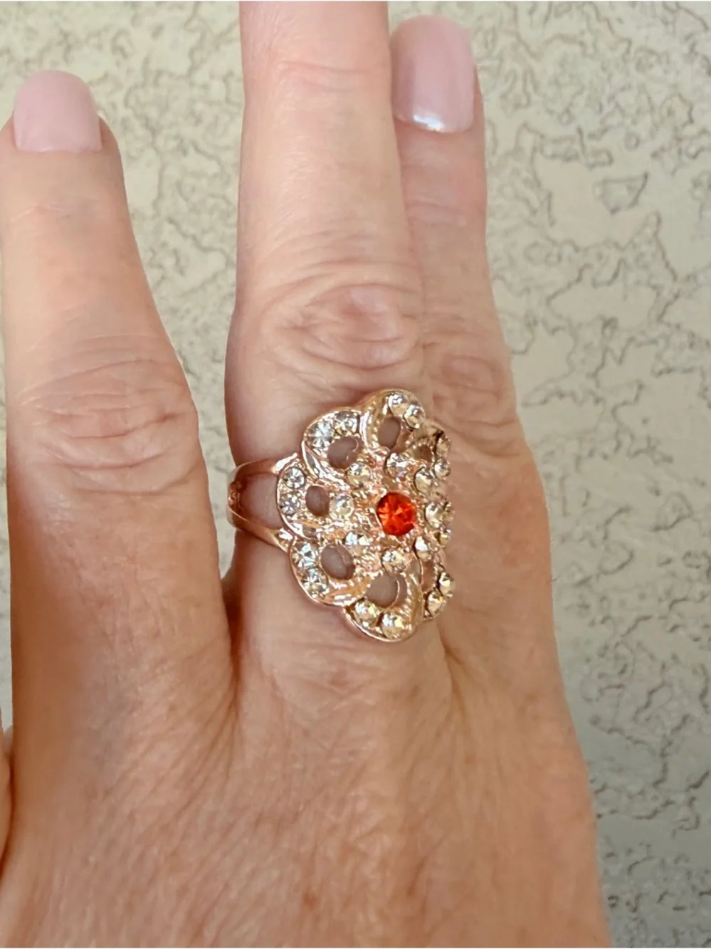 Intricate Rose Gold Floral Statement Ring with Orange Center Stone